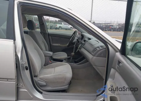 2003 Toyota Camry Le from USA, damaged, VIN 4T1BE32K13U765141